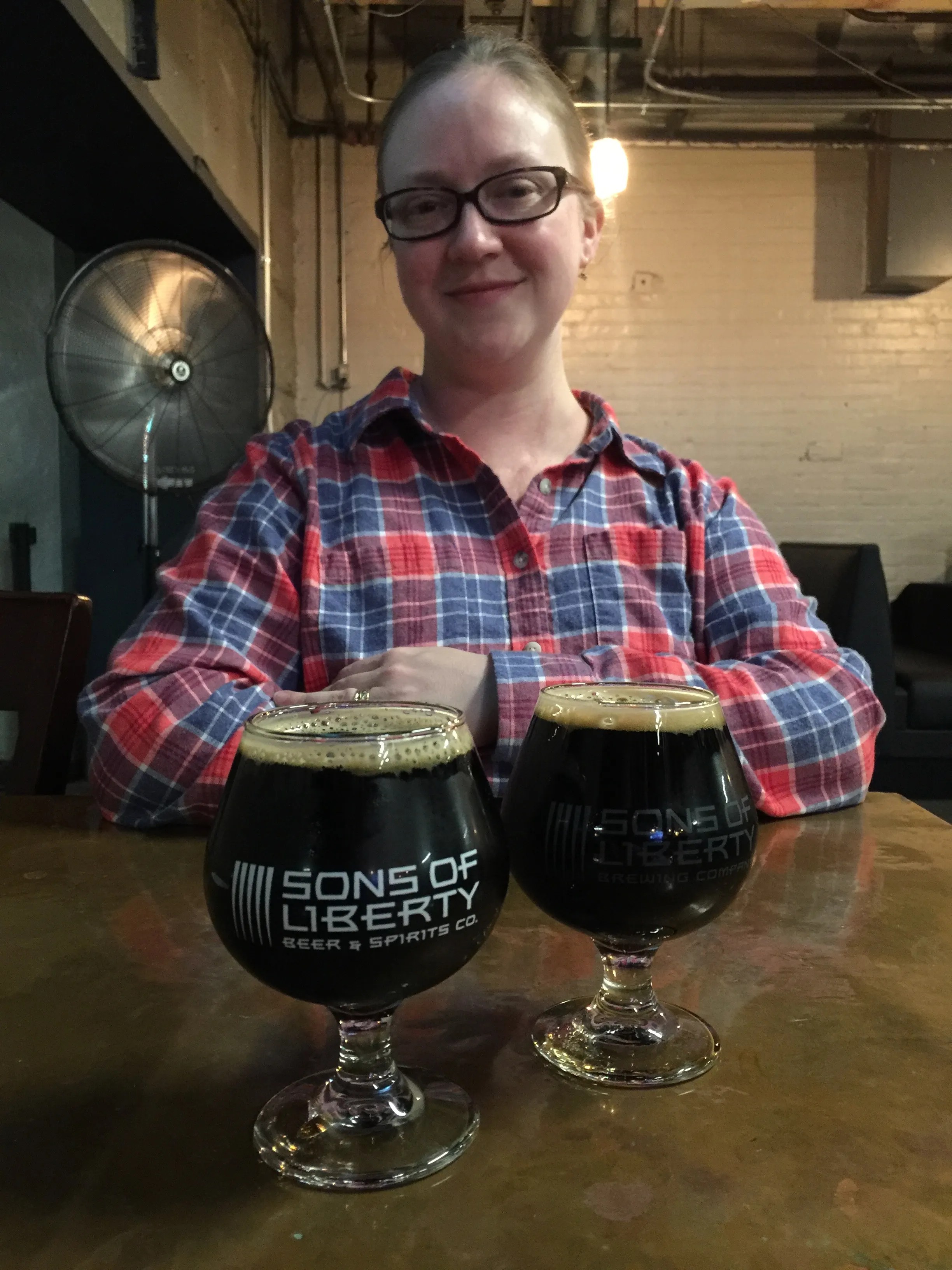 Shelley and I having a beer at Sons of Liberty